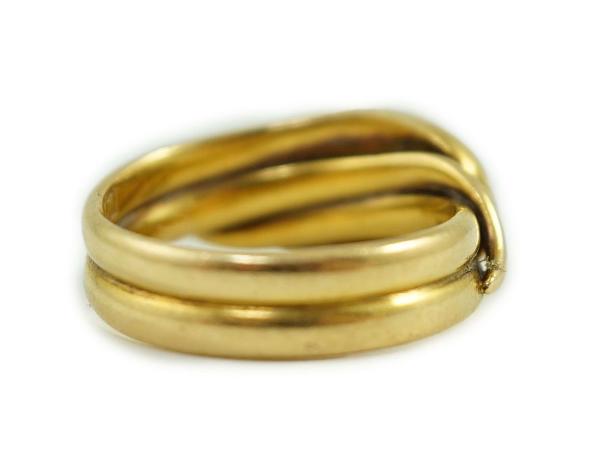 An Edwardian 18ct gold entwined twin serpent ring